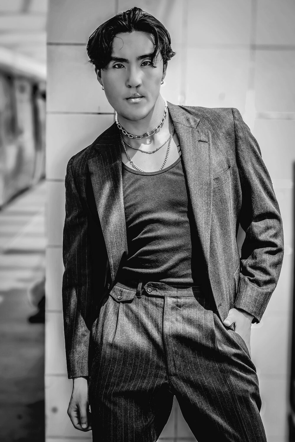 Black and white portrait in a pinstripe suit